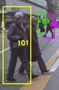 colored rectangles around individuals in surveillance video