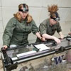 two students conduct tests in zero gravity