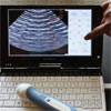 laptop with ultrasound device