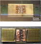 microrobot photo showing controllers in the middle and grids of tiny feet on either end