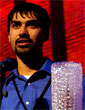 Shwetak Patel accepting 2010 Flashie award