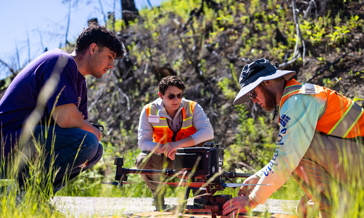 People standing around drone