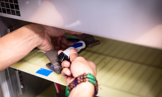 A small battery being worked on