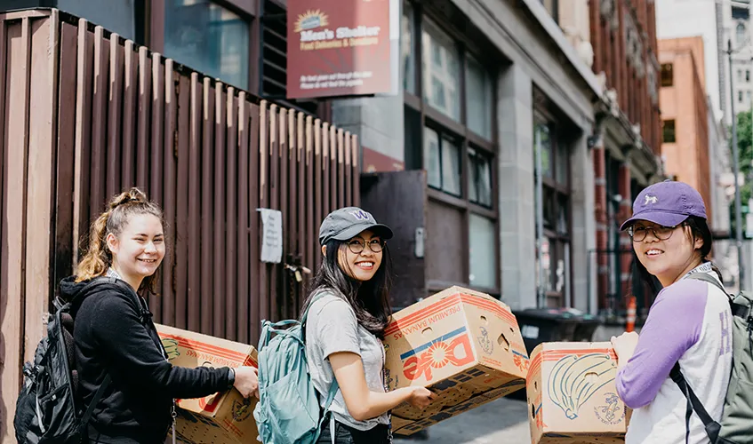 photo of students carrying food