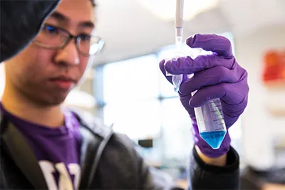 Student in research lab