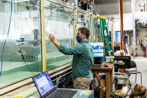 Associate Professor Mike Motley diagrams the test parameters being studied through the experiments.