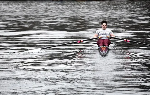 woman rowing