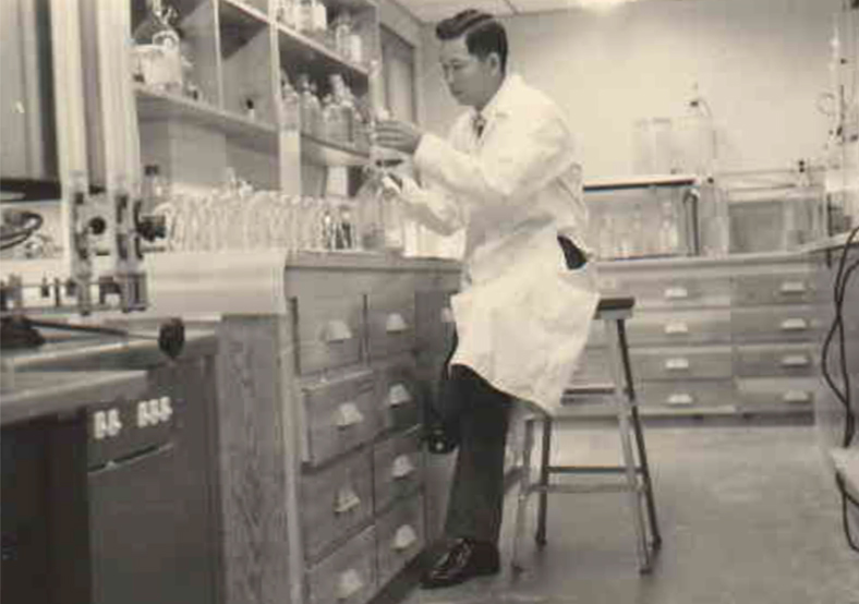 Paul at work in a laboratory. Photo courtesy of the Liao family.