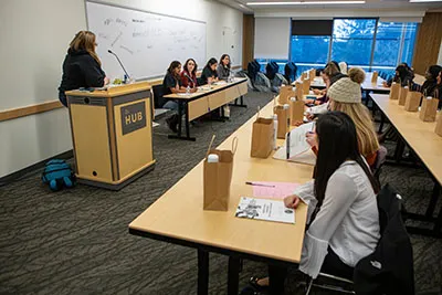 Guests listening to a workshop panel