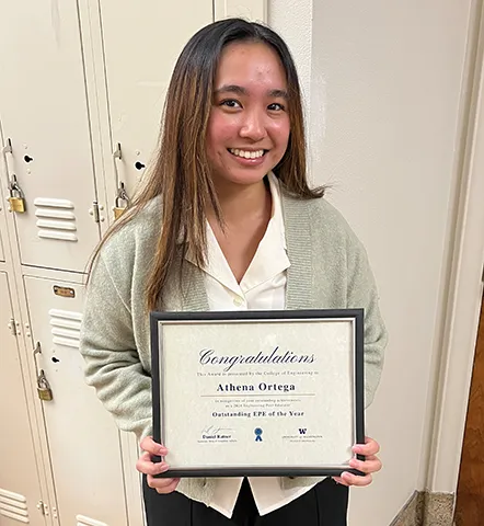 Athena Ortega holding 2024 Outstanding EPE of the Year Award